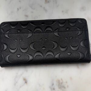 Coach Elegant Black Embossed Wallet